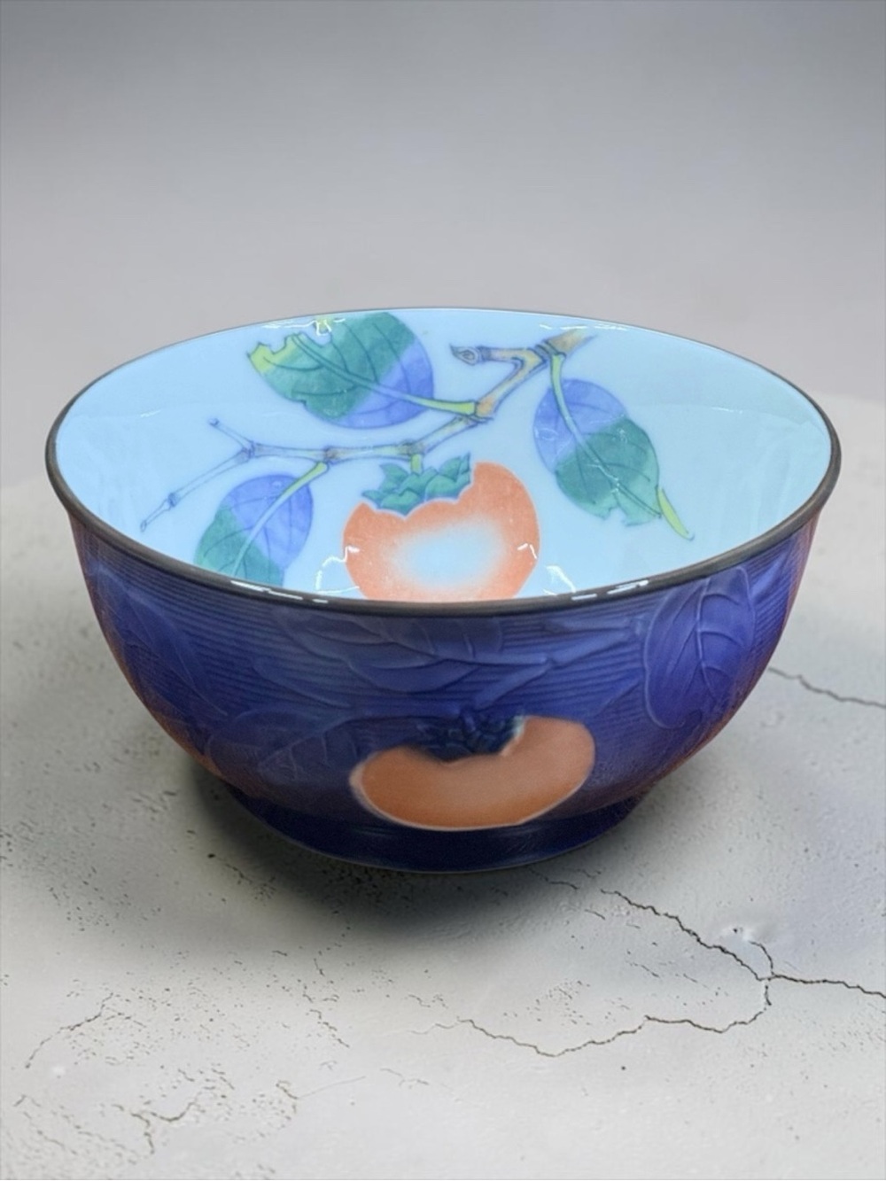 Blue Bowl with Persimmons and Leaves by Andrea by Sadek